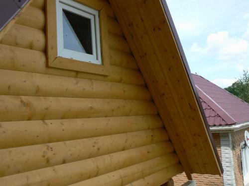 Деревянный фронтон в кирпичном доме. Материалы для облицовки фронтона частного дома