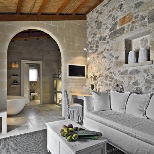 Интерьер отеля "Relais Masseria Capasa" в Лечче, Италия 10