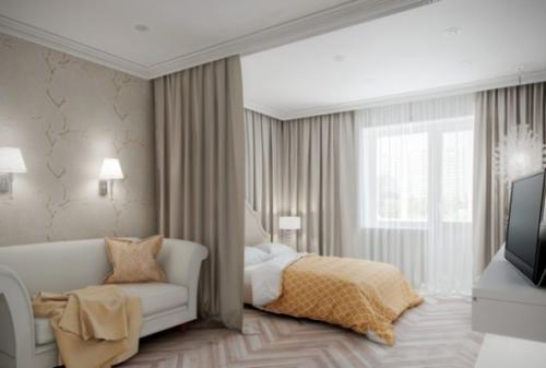 Идеи разделения комнаты на спальню и гостиную. Идея размещения и использования кровати в гостиной