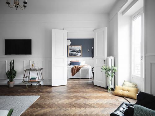 Бело-синий интерьер скандинавской квартиры (89 кв. м) 08