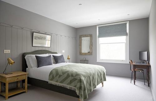 Дом в Лондоне со спокойным интерьером и уютным задним двором 16