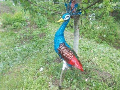 Как сделать павлина из бутылок пластиковых. Видео-уроки 01