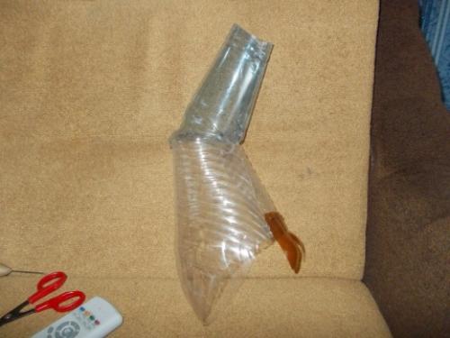 Как сделать павлина из бутылок пластиковых. Видео-уроки 04