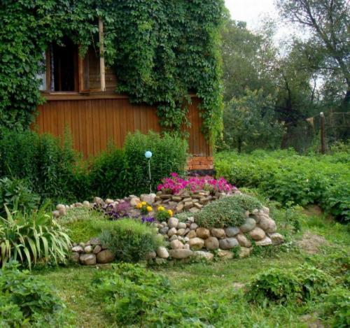 Оформление клумб камнями. Клумба из камней своими руками — секреты мастера, как самостоятельно оформить каменный цветник! (фото и видео)