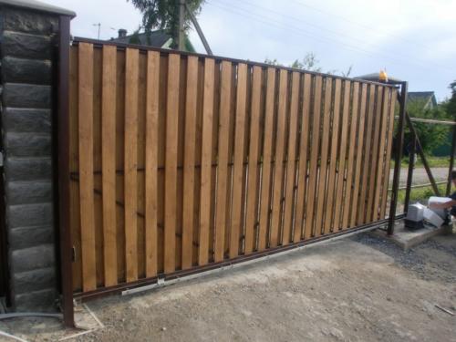 Примеры ворот откатных. Откатные ворота — идеи реализации своими руками. Обзор самых удачных вариантов (105 фото)