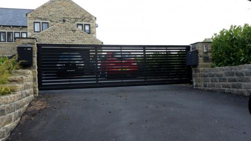 Примеры ворот откатных. Откатные ворота — идеи реализации своими руками. Обзор самых удачных вариантов (105 фото)