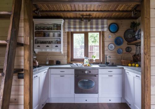 Как организовать пространство внутри дачного дома. Как расположить мебель внутри садового домика на кухне