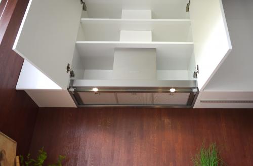 Как установить вытяжку в шкаф. Правила проведения монтажа