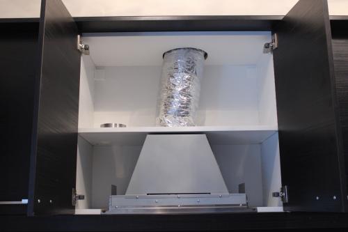 Как установить вытяжку в шкаф. Правила проведения монтажа