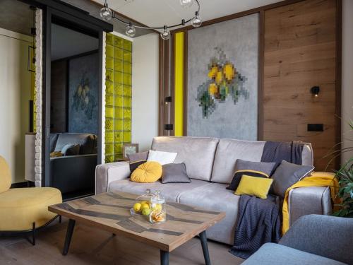 Серый диван: стильное и универсальное решение для интерьера гостиной 18 Серый диван: стильное и универсальное решение для интерьера гостиной 18