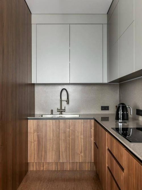 Современный лаконичный интерьер в тёплых оттенках - это пространство, в котором минимализм сочетается с ощущением уюта и спокойствия. 04