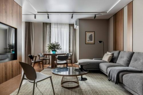 Современный лаконичный интерьер в тёплых оттенках - это пространство, в котором минимализм сочетается с ощущением уюта и спокойствия.  