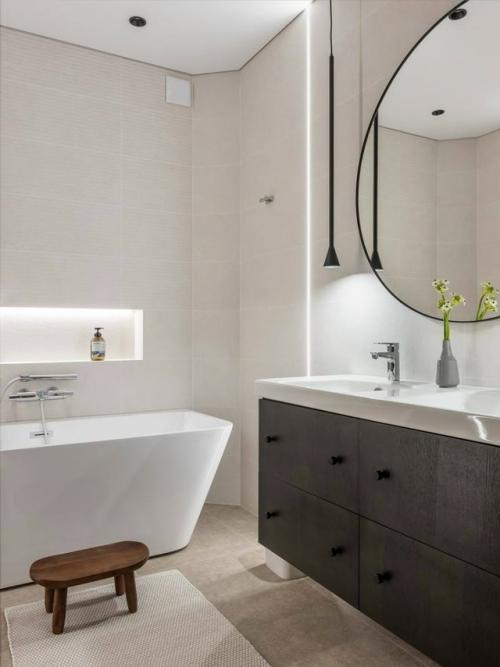 Современный лаконичный интерьер в тёплых оттенках - это пространство, в котором минимализм сочетается с ощущением уюта и спокойствия. 09