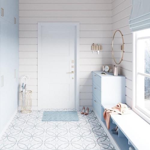 Необычно нежные цвета для входной зоны в частном доме.