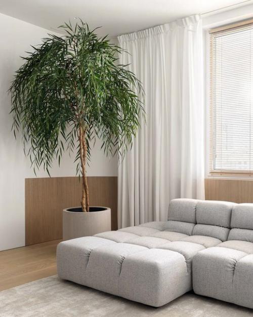 Интересно обыграны углы, цвет пола уютный, мебель мягкая оригинальная. 05