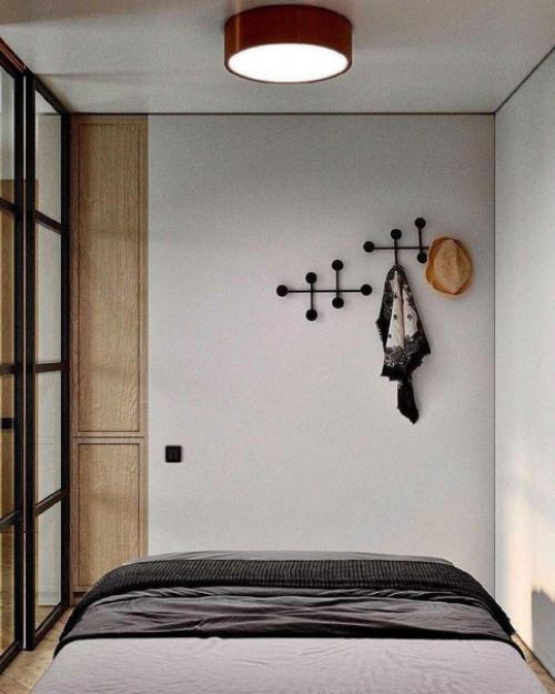 Проект квартиры, в котором прекрасно сочетаются светлые тона и дерево. 06