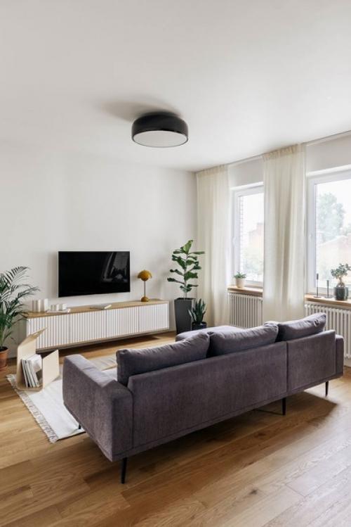 Минимализм в этом интерьере предусмотрел все для комфортной жизни - простоту, динамику, рациональное использование площади и многое другое. 02