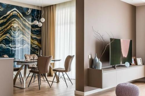 Дизайн квартиры с уютной тёплой атмосферой построен на тонком балансе мягкой цветовой палитры и выразительных акцентов. 02