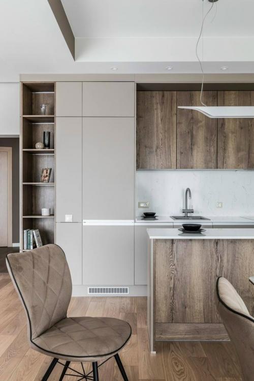 Дизайн квартиры с уютной тёплой атмосферой построен на тонком балансе мягкой цветовой палитры и выразительных акцентов.  