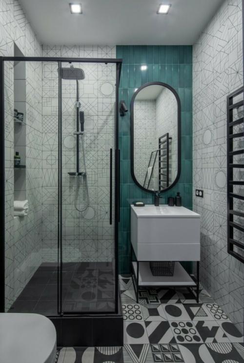 Яркая студия, в которой уместили кухню, гостиную и спальню. 07