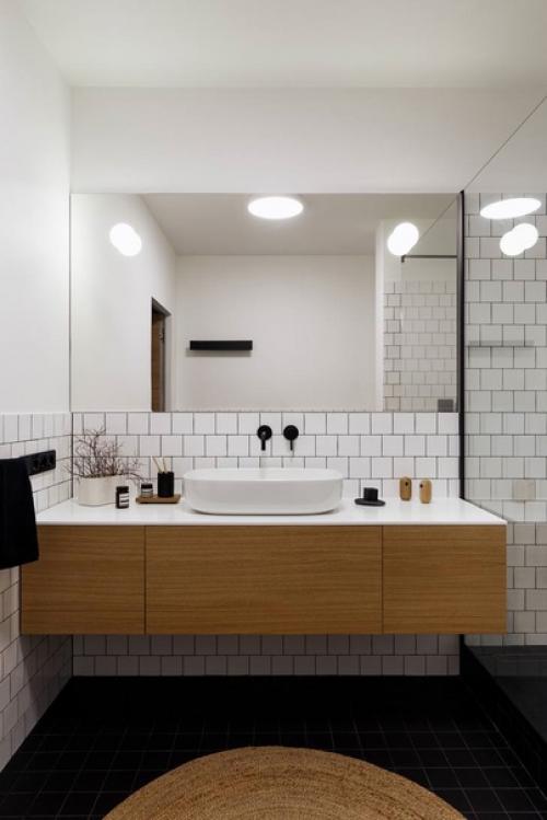 Минимализм в этом интерьере предусмотрел все для комфортной жизни - простоту, динамику, рациональное использование площади и многое другое. 08