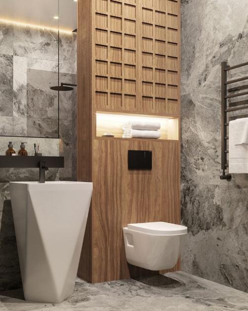 Интерьер санузла в сером керамограните с деревяннои отделкои колонны.