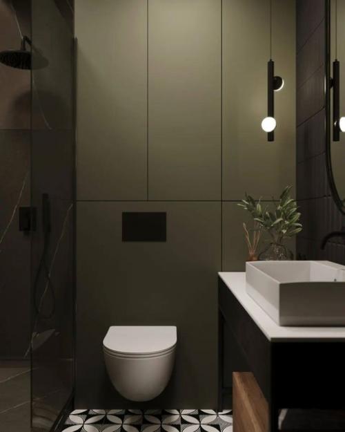 Минималистичный интерьер, выполненный в серых и бежевых оттенках с зелеными акцентами. 08