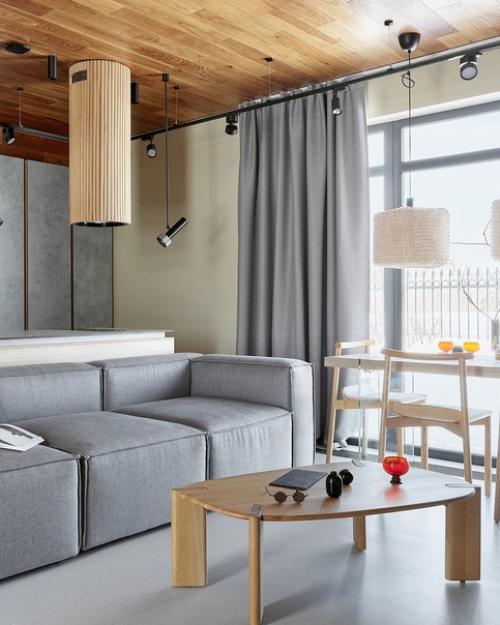 Интерьер гостевого шале, которое продолжило архитектурную концепцию загородного дома. 01