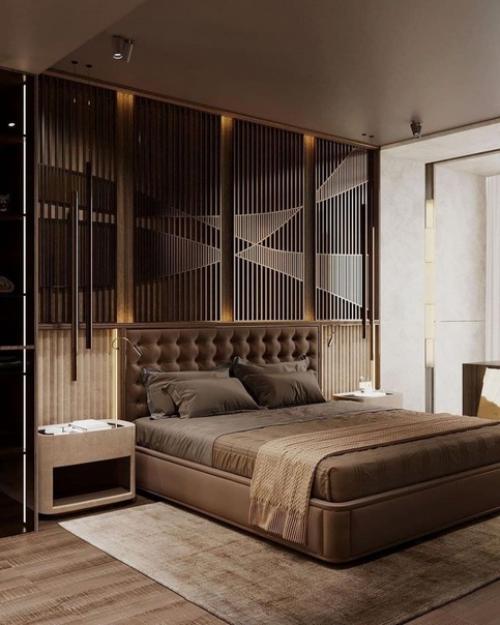 Дизайн спальни. Сочетание шикарного коричневого цвета и подсветки в тёплом оттенке.