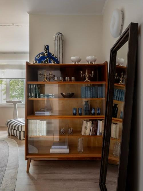 Эта квартира - не просто современное пространство, а дом с историей и душой. 02