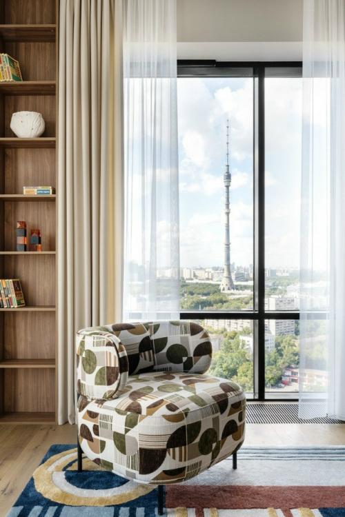 Проект квартиры с видом на останкинскую башню получился светлым, спокойным и очень уютным - идеальным для жизни молодой семейной пары. 03