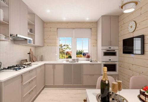 Светлая кухня - гостиная с бежевым кухонным гарнитуром. 02