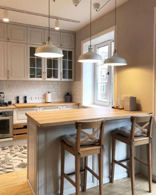 Интерьер радует с первого взгляда - простор, свет, тёплые тона и продуманные детали. 04