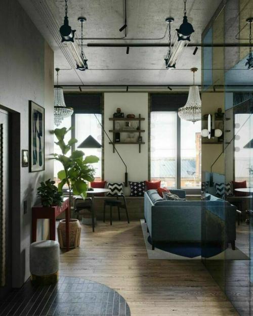 Дизайнеры создали необычный многослойный интерьер, в котором сочетаются индустриальная эстетика и уютные элементы. 06