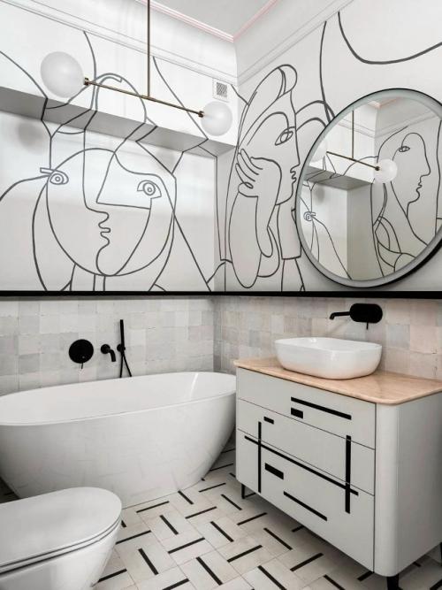 Интерьер создаёт гармоничный баланс между спокойной базой и выразительными цветовыми акцентами. 02