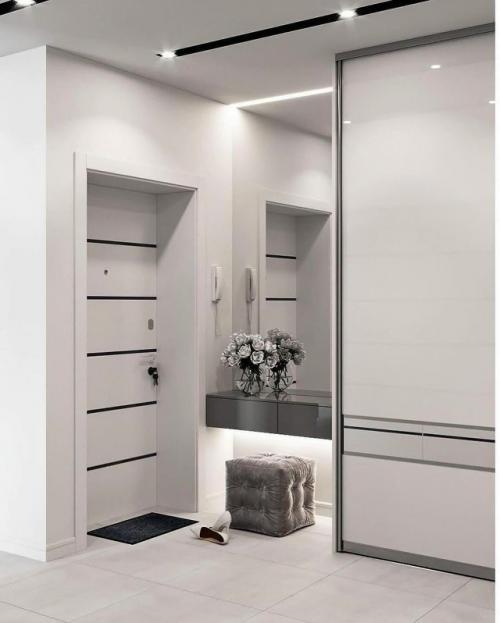 Этот интерьер построен на ощущении спокойствия, чистоты и продуманной сдержанности. 03