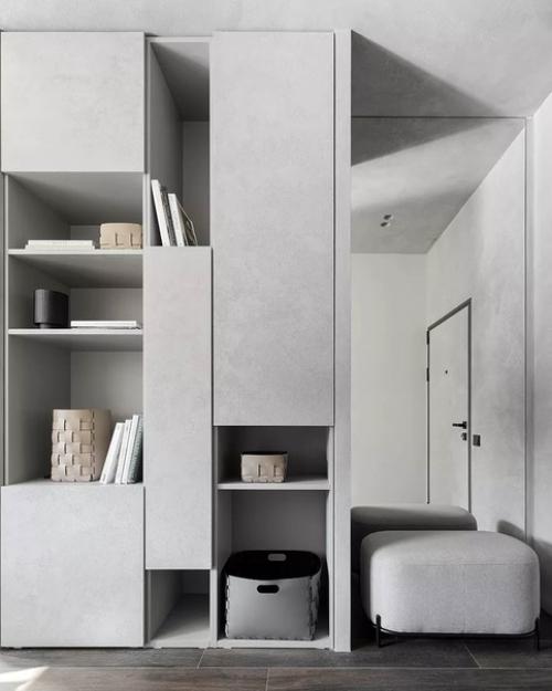 Дизайнеры сложили объемно - пространственную композицию из простых геометрических форм в светлых тонах. 05