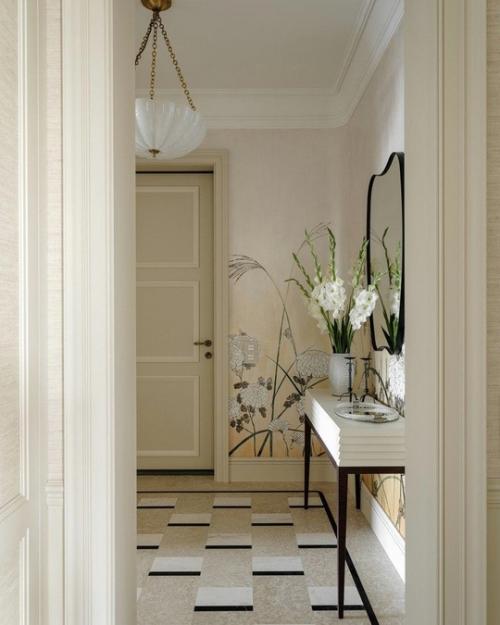 Интерьер глубоко индивидуален и наполнен искусством и акцентными винтажными предметами, которые отражают характеры своих владельцев. 06