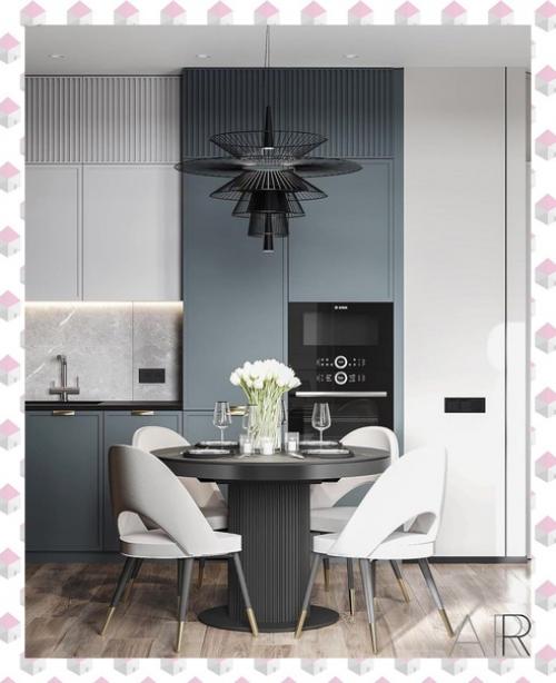 Угловой кухонный гарнитур, благодаря чему удалось разместить всю необходимую технику.