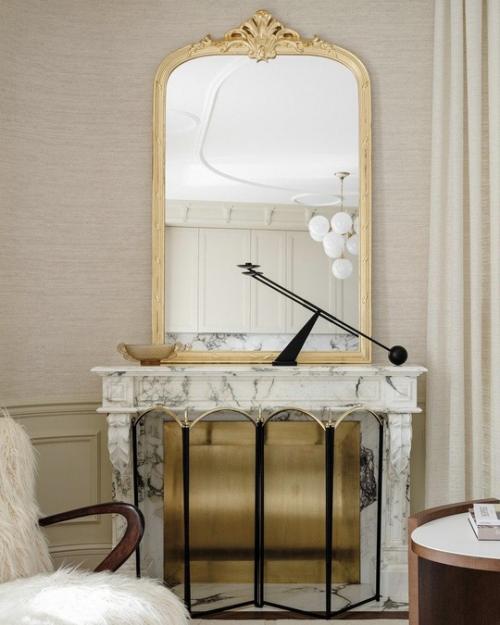 Интерьер глубоко индивидуален и наполнен искусством и акцентными винтажными предметами, которые отражают характеры своих владельцев. 05