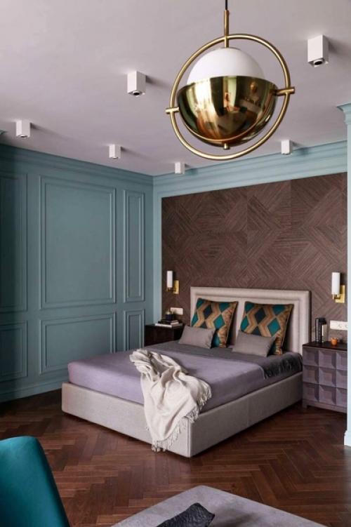 Просторная квартира - студия с насыщенным бирюзовым акцентным цветом, который отлично освежает интерьер. 03