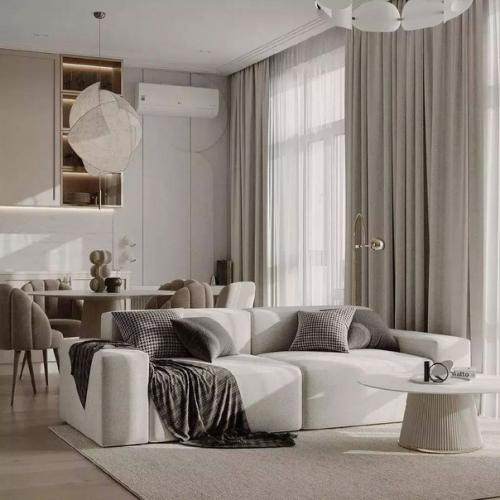 Бежевый цвет в сочетании с белым создают гармоничный дуэт в интерьере этой кухни - гостиной. 03