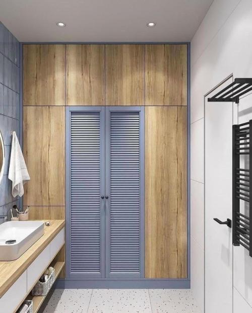 Современная ванная комната, выполненная в спокойной и уютной цветовой гамме, сочетает в себе функциональность и продуманный дизайн. 06