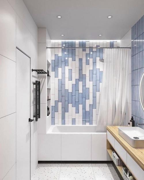 Современная ванная комната, выполненная в спокойной и уютной цветовой гамме, сочетает в себе функциональность и продуманный дизайн. 05