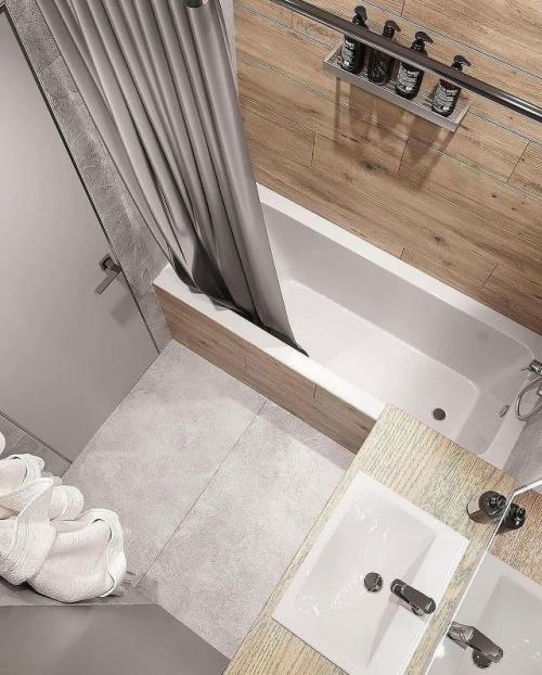 Современная ванная комната, выполненная в спокойной и уютной цветовой гамме, сочетает в себе функциональность и продуманный дизайн. 04