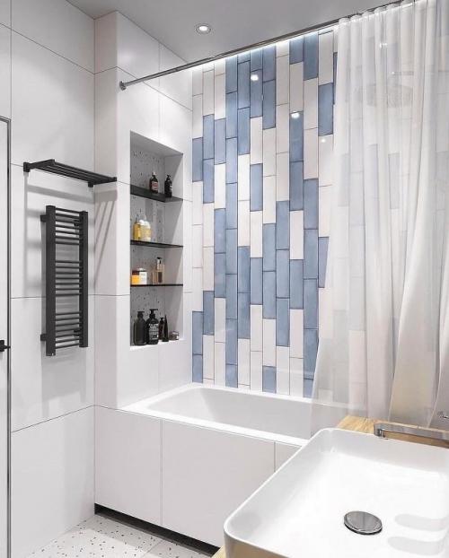 Современная ванная комната, выполненная в спокойной и уютной цветовой гамме, сочетает в себе функциональность и продуманный дизайн. 01