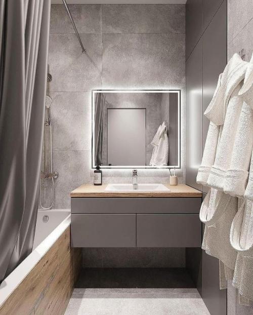 Современная ванная комната, выполненная в спокойной и уютной цветовой гамме, сочетает в себе функциональность и продуманный дизайн. 07