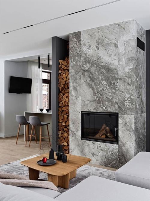 Обволакивающий интерьер загородного дома с акцентной винтовой лестницей. 06