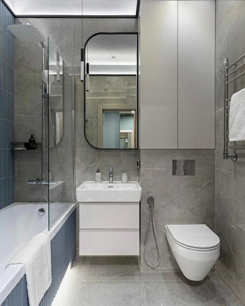 Интерьер в серо - бежевой гамме, с добавлением голубых и сине-зеленых оттенков в качестве акцентов. 07