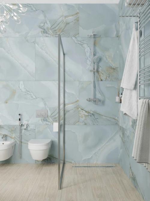 Лёгкость, естественность и деликатная эстетика - всё это соединилось в этом уютном проекте душевой. 04